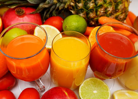 Fruit and vegetable juices on a white backgroundの写真素材
