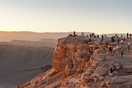 ATACAMA DESERT, CHILE - NOV 3, 2014: Unidentified tourists making pictures in the Atacama desert, Chile. Atacama Desert proper occupies 105,000 square kilometresのeditorial素材