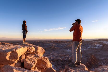 ATACAMA DESERT, CHILE - NOV 3, 2014: Unidentified tourists making pictures in the Atacama desert, Chile. Atacama Desert proper occupies 105,000 square kilometresのeditorial素材