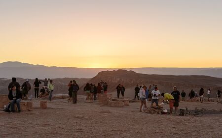ATACAMA DESERT, CHILE - NOV 3, 2014: Unidentified tourists making pictures in the Atacama desert, Chile. Atacama Desert proper occupies 105,000 square kilometresのeditorial素材