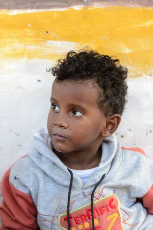 ASWAN, EGYPT - DEC 2, 2014: Unidentified Egyptian little boy portrait. 90 of Egyptian people are...