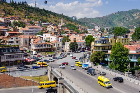 TBILISI, GEORGIA - JULY 18, 2014: Architecture and traffic of Tbilisi, Georgia. Tbilisi is the capital and the largest city of Geogia with 1,5 mln people populationのeditorial素材