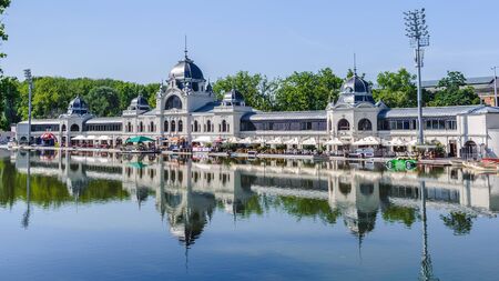 Building in Budapest with its reflection in the waterの写真素材