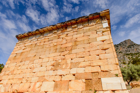 Athenian Treasury in Delphi, an archaeological site in Greece, at the Mount Parnassus. Delphi is...