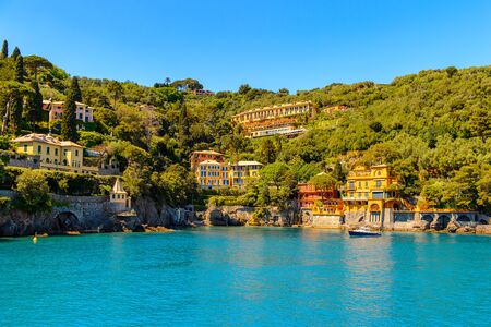 Portofino, is an Italian fishing village, Genoa province, Italy. A vacation resort with a picturesque harbour and with celebrity and artistic visitors.のeditorial素材
