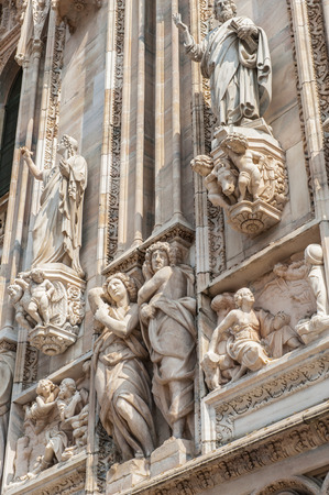 Sculptures on the Milan Cathedral (Duomo di Milano),  the largest cathedral in Italyの写真素材