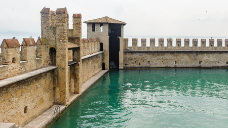 Wall of the Castello Scaligero di Sirmione (Sirmione Castle), built in XIV century, Lake Garda, Sirmione, Italyのeditorial素材