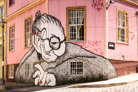 VALPARAISO, CHILE - NOV 9, 2014: Colourful graffiti on a house in Valparaiso, Chile. Valparaiso Historic centre is a UNESCO world heritage siteのeditorial素材