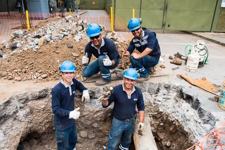 SANTIAGO, CHILE - NOV 1, 2014:  Unidentified Chilean constructor during their work. Chilean people are mainly of mixed Spanish and Amerindian descentのeditorial素材