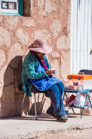 ATACAMA, CHILE - NOV 1, 2014:  Unidentified Chilean woman in a traditional hat. Chilean people are mainly of mixed Spanish and Amerindian descentのeditorial素材