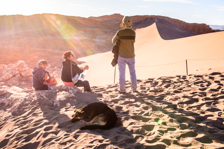 ATACAMA DESERT, CHILE - NOV 3, 2014: Unidentified tourists in the Atacama desert, Chile. Atacama Desert proper occupies 105,000 square kilometresのeditorial素材