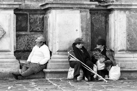 QUITO, ECUADOR - JAN 1, 2015: Unidentified Ecuadorian old ladies in the street. 71,9% of Ecuadorian people belong to the Mestizo ethnic groupのeditorial素材