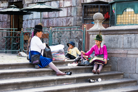 QUITO, ECUADOR - JAN 2, 2015: Unidentified Ecuadorian people in the street in Quito. 71,9% of Ecuadorian people belong to the Mestizo ethnic groupのeditorial素材