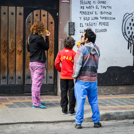 OTAVALO, ECUADOR - JAN 3, 2015: Unidentified Ecuadorian people in the street. 71,9% of Ecuadorian people belong to the Mestizo ethnic groupのeditorial素材