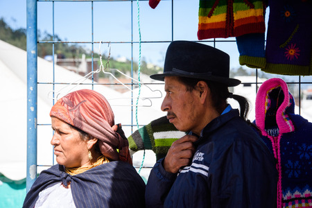 OTAVALO, ECUADOR - JAN 3, 2015: Unidentified Ecuadorian man in bowler hat at the Otavalo Market. 71,9% of Ecuadorian people belong to the Mestizo ethnic groupのeditorial素材