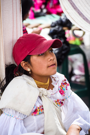 OTAVALO, ECUADOR - JAN 3, 2015: Unidentified Ecuadorian girl at the Otavalo Market. 71,9% of Ecuadorian people belong to the Mestizo ethnic groupのeditorial素材