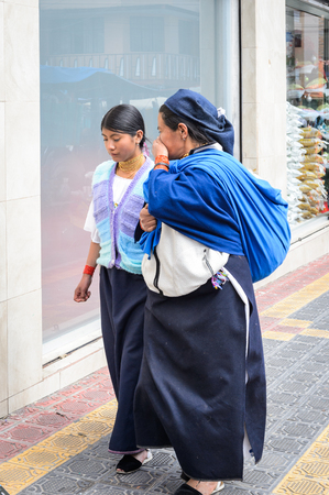 OTAVALO, ECUADOR - JAN 3, 2015: Unidentified Ecuadorian women at the Otavalo Market. 71,9% of Ecuadorian people belong to the Mestizo ethnic groupのeditorial素材