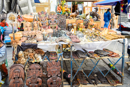 OTAVALO, ECUADOR - JAN 7, 2015: Souvenirs of the Otavalo market  designed and built in 1970 by Dutch architect Tonny Zwolloのeditorial素材