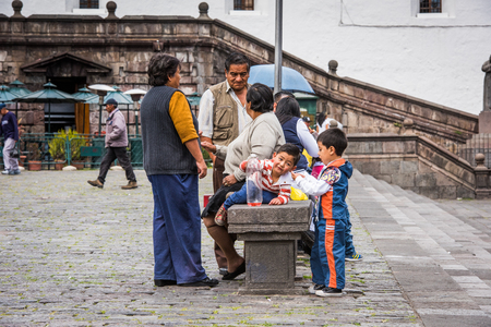 QUITO, ECUADOR - JAN 2, 2015: Unidentified Ecuadorian people in the street. 71,9% of Ecuadorian people belong to the Mestizo ethnic groupのeditorial素材