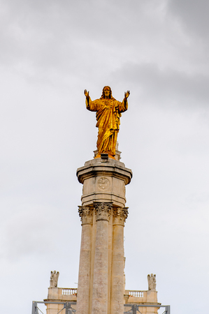 Statue to the Sacred Heart of Jesus,  Sanctuary of Fatima, Portugal. Important destinations for the Catholic pilgrims and touristsのeditorial素材