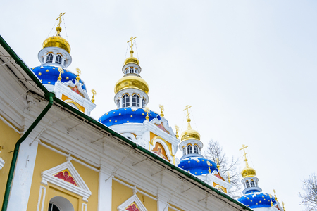 Blue chapels of the church of the Pskov-Caves Monastery, a Russian Orthodox male monastery, located in Pechory, Pskov Oblast in Russia.の写真素材