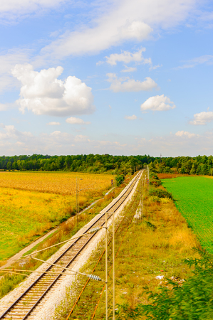 Railway road on the green fieldの写真素材