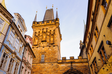 Tower of the Charles Bridge, a famous historic bridge that crosses the Vltava river in Prague, Czech Republic.の写真素材