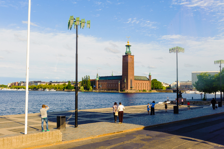 Stockholm City Hall, the building of the Municipal Council for the City of Stockholm in Sweden over the lake Malarenのeditorial素材