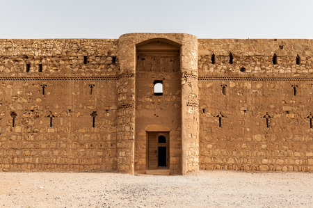 Front part of the Qasr Kharana, one of the best-known of the desert castles in eastern Jordanの写真素材