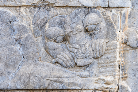 Relief of a lion biting antelope.Persepolis, the ceremonial capital of the Achaemenid Empire.の写真素材