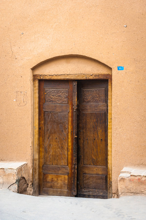 Old door of an old houseの写真素材