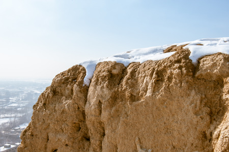 Fire temple of Isfahan mountain in winter with snowの写真素材