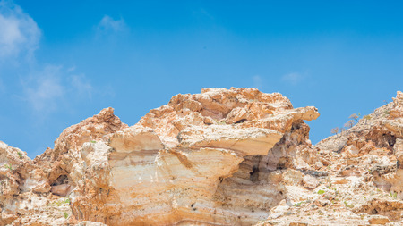 Rocks in front of the blue skyの写真素材
