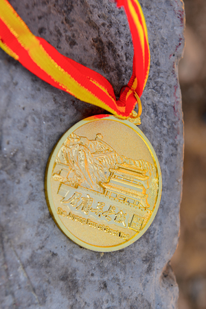 Medal for hiking the Great Wall of China. One of the Seven Wonders of the world. UNESCO World Heritage Siteの写真素材