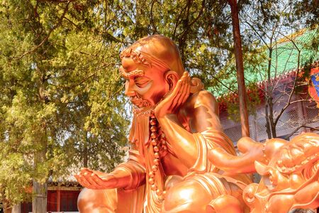 Statue at the Authentic Shaolin Monastery (Shaolin Temple), a Zen Buddhist temple.の写真素材