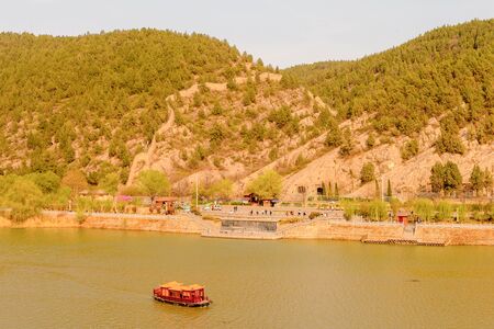 River near Longmen Grottoes ( Dragon's Gate Grottoes) or Longmen Caves.の写真素材