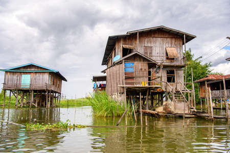 Nature and houses of the Inpawkhon village over the Inle Sap,a freshwater lake in the Nyaungshwe Township of Taunggyi District of Shan State, Myanmarの写真素材