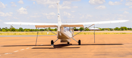 MAUN, BOTSWANA - JAN 11, 2016: Little plane at Airport of Maun, Botswana. Maun is the fifth largest town in Botswana and the gateway to Okavango Deltaのeditorial素材