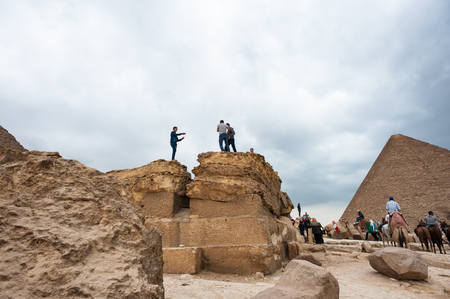 SAQQARA, EGYPT - NOV 14, 2014: Unidentified tourists visiting Saqqara Necropolis, which is a UNESCO World Heritageのeditorial素材