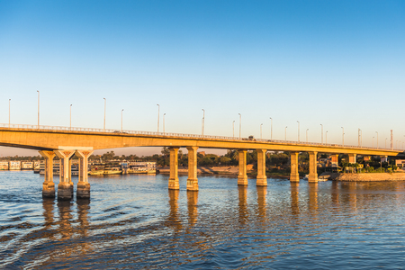 LUXOR, EGYPT - NOV 30, 2014: Bridge over the river NIle near Luxor. Nile is 6,853 km long. The Nile is an "international" river shared by eleven countriesのeditorial素材