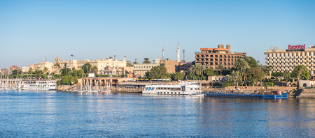 LUXOR, EGYPT - NOV 30, 2014: TOuristic boat over  the river NIle near Luxor. Nile is 6,853 km long. The Nile is an "international" river shared by eleven countriesのeditorial素材