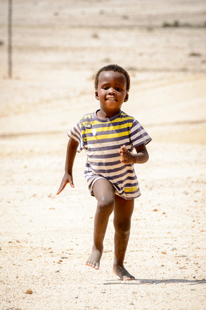 SWAKOPMUND, NAMIBIA - JAN 5, 2016:  Unidentified Ovambo little boy in Namibia.  Ovambo is the most popular ethnic groupのeditorial素材