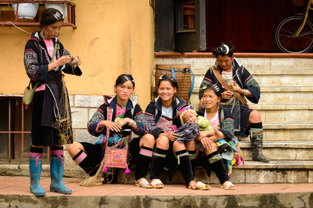SAPA, VIETNAM - SEP 20, 2014: Unidentified Hmong women in the Hmong traditional costume. Hmong people is a minority ethnic group living in Sapaのeditorial素材