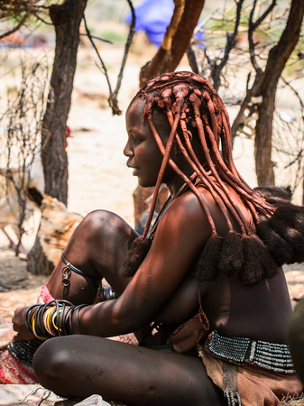 KAMANJAB, NAMIBIA - SEPTEMBER 07, 2015: Unidentified woman from Himba tribe. The Himba are indigenous people living in northern Namibia and Angolaのeditorial素材