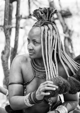 KAMANJAB, NAMIBIA - SEPTEMBER 07, 2015: Unidentified woman from Himba tribe. The Himba are indigenous people living in northern Namibia and Angolaのeditorial素材