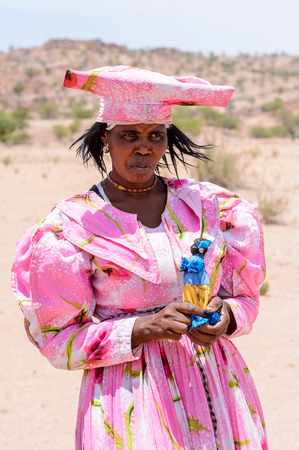 KAMANJAB, NAMIBIA - JAN 6, 2016: Unidentified herero woman in Namibia. There were an estimated 250,000 Herero people in Namibia in 2013のeditorial素材