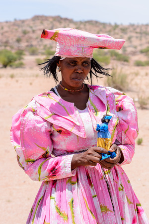 KAMANJAB, NAMIBIA - JAN 6, 2016: Unidentified herero woman in Namibia. There were an estimated 250,000 Herero people in Namibia in 2013のeditorial素材