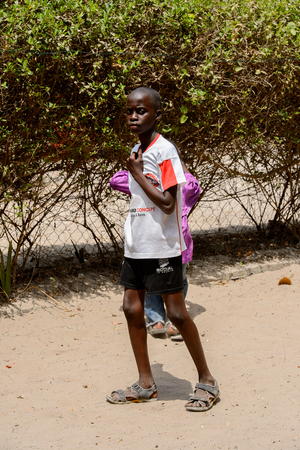 KASCHOUANE, SENEGAL - APR 29, 2017: Unidentified Diola little boy stands in Kaschouane village. Diolas are the ethnic group predominate in the region of Casamanceのeditorial素材