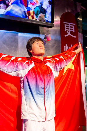 SHANGHAI, CHINA - APR 3, 2016: Liu Xiang at the Shanghai Madame Tussauds wax museum. Marie Tussaud was born as Marie Grosholtz in 1761のeditorial素材