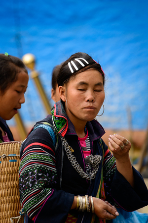 SAPA, VIETNAM - SEP 20, 2014: Unidentified Hmong woman in the Hmong traditional costume. Hmong people is a minority ethnic group living in Sapaのeditorial素材
